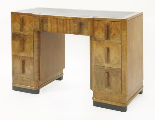 Lot 182 - An Art Deco kneehole desk