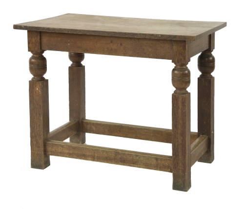 Lot 90 - An Arts and Crafts oak centre table
