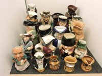 Lot 466 - A collection of character and Toby jugs