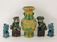 Lot 446 - A pair of 20th century porcelain Buddhist lions