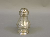 Lot 210 - A silver pepper and cover