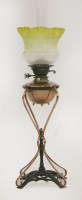 Lot 115 - A copper and iron table lamp