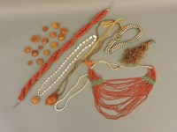 Lot 89 - A row of graduated freeform amber beads
