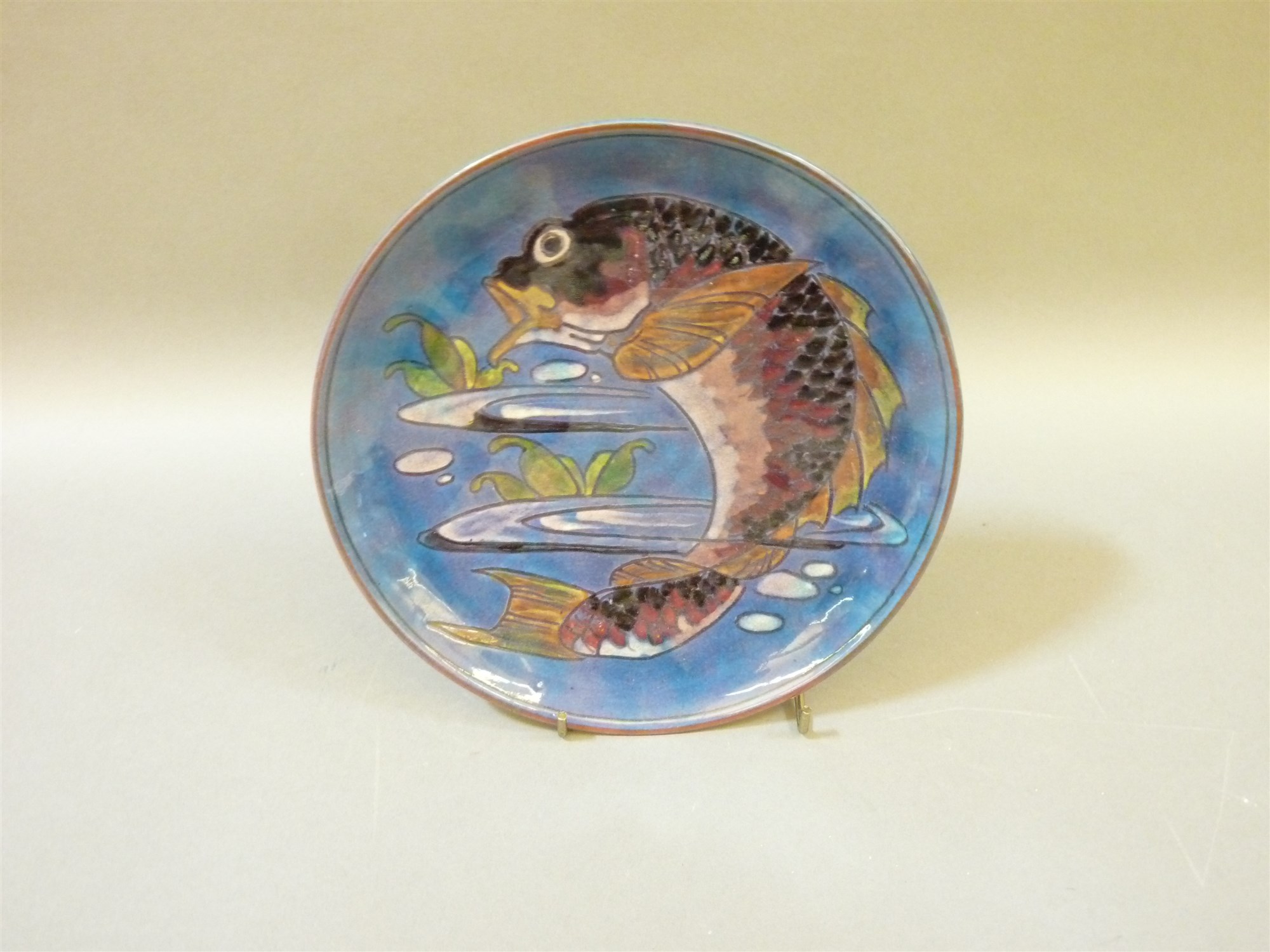 Lot 455 A Baron Barnstaple pottery dish