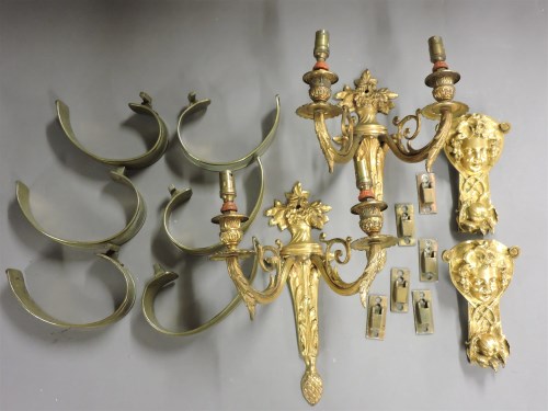 Lot 429 - A set of six brass curtain backs