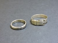 Lot 61 - A white metal buckle ring