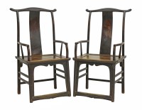 Lot 1422 - A pair of dark-stained armchairs