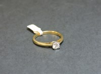 Lot 9 - An 18ct gold single stone diamond ring