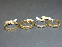 Lot 20 - Four 9ct gold diamond set wedding rings