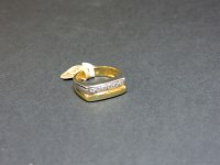 Lot 17 - A gentleman's 18ct yellow and white gold diamond set signet ring