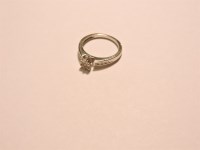 Lot 10 - An 18ct white gold diamond set cluster ring