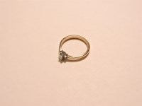 Lot 14 - A 9ct yellow and white gold single stone emerald cut diamond ring
