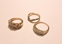 Lot 6 - A 9ct gold graduated diamond set ring