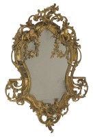 Lot 401 - A giltwood and composition wall mirror