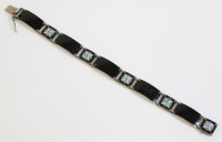 Lot 40 - A Norwegian black enamel plaque bracelet