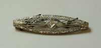 Lot 1 - An American diamond set bar brooch