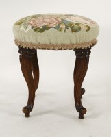 Lot 676 - A late 19th century carved mahogany stool