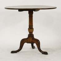 Lot 636 - A George III mahogany circular top tripod table