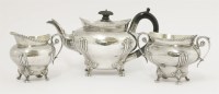 Lot 144 - A late Victorian silver three-piece bachelor tea set