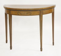 Lot 1630 - A George III satinwood demi-lune fold over card table