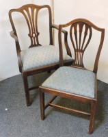 Lot 687 - A pair of George III mahogany elbow chairs