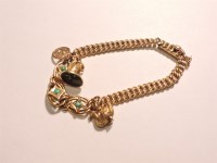 Lot 67 - An Edwardian double curb link gold bracelet