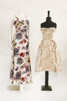 Lot 121 - A 1950s cream silk full-length evening dress