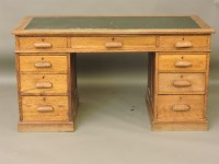 Lot 573 - An oak pedestal desk