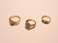 Lot 12 - A 9ct gold diamond set cluster ring