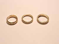 Lot 15 - Three 9ct gold diamond set band rings