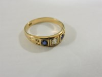 Lot 151 - An Edwardian diamond and sapphire gypsy ring