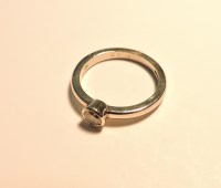 Lot 153 - A platinum single stone diamond ring