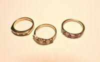 Lot 215 - A 9ct gold ruby and diamond half hoop ring