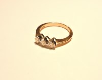 Lot 216 - A 9ct gold three stone princess cut diamond ring
