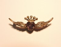 Lot 277 - An amethyst and split pearl winged heart and coronet brooch