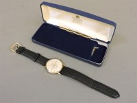 Lot 309 - A gentleman's 9ct gold Garrard quartz strap watch