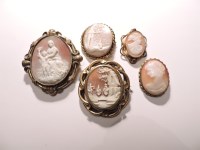 Lot 315 - Five rolled gold and gilt metal shell cameo brooches