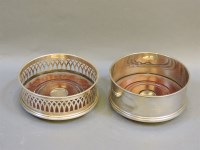 Lot 451 - Two modern silver wine coasters