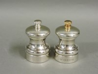 Lot 454 - A modern boxed pair of silver pepper and salt grinders