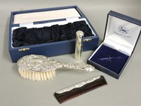 Lot 461 - A modern cased silver mounted child's hairbrush