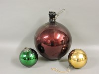 Lot 548 - A large blown glass witches ball