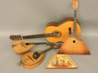 Lot 553 - Five stringed instruments