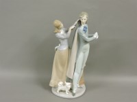 Lot 560 - A Lladro group