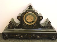 Lot 563 - A late 19th century French black marble mantel clock