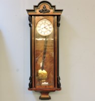 Lot 568 - A late 19th century veneered Vienna twin weight regulator wall clock