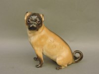 Lot 581 - A Meissen pug dog