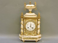 Lot 608 - A late 19th century alabaster and gilt metal mantel clock