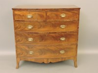 Lot 773 - A Georgian mahogany bow front chest of drawers