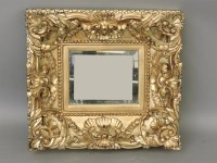 Lot 777 - A modern ornate gilt mirror