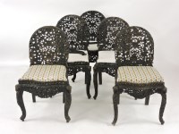 Lot 794 - Five Anglo-Indian carved hardwood chairs